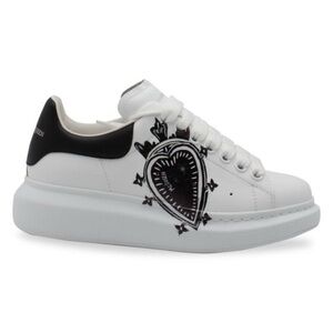 Preloved Alexander McQueen low-top sneakers, preloved, used condition.